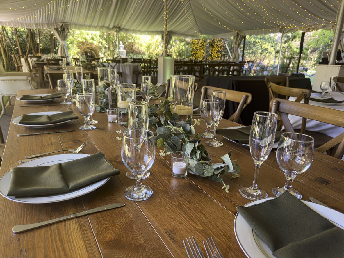 Wedding ceremony setup with seating and floral arrangements